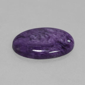 Charoíta violeta natural 28,06ct, corte oval, opaco