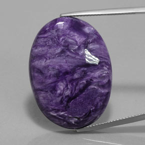 Charoíta violeta natural 28,09ct, corte oval, opaco