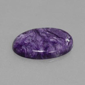 Charoíta violeta natural 28,09ct, corte oval, opaco