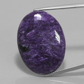 Charoíta violeta natural 28,54ct, corte oval, opaco