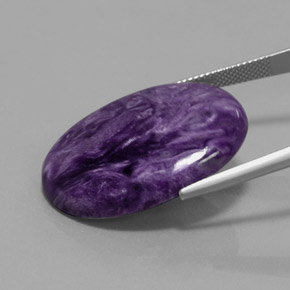Charoíta violeta natural 27,90ct, corte oval, opaco