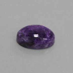 Charoíta violeta natural 6,09ct, corte oval, opaco