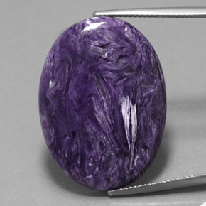 Charoíta violeta natural 24,63ct, corte oval, opaco