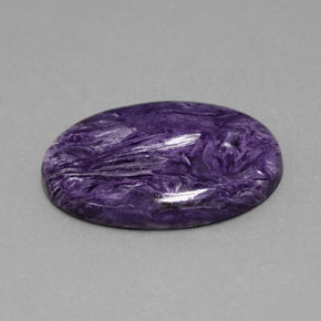 Charoíta violeta natural 24,63ct, corte oval, opaco