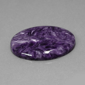 Charoíta violeta natural 23,69ct, corte oval, opaco