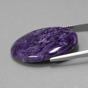 Charoíta violeta natural 23,93ct, corte oval, opaco