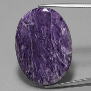Charoíta violeta natural 25,13ct, corte oval, opaco