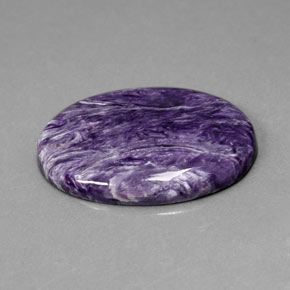 Charoíta violeta natural 25,13ct, corte oval, opaco