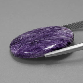 Charoíta violeta natural 25,13ct, corte oval, opaco