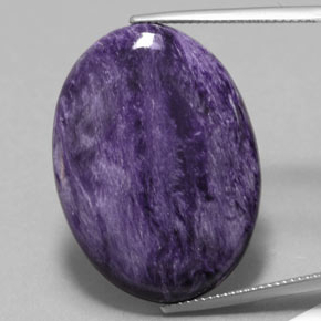 Charoíta violeta natural 26,90ct, corte oval, opaco