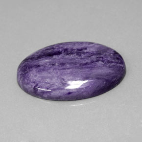 Charoíta violeta natural 26,90ct, corte oval, opaco