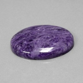 Charoíta violeta natural 27,16ct, corte oval, opaco