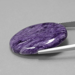 Charoíta violeta natural 27,16ct, corte oval, opaco