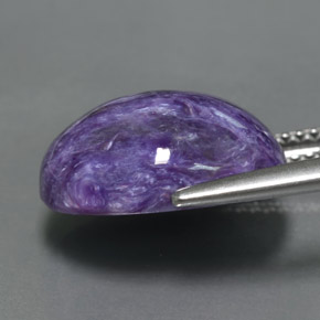 Charoíta violeta natural 6,72ct, corte oval, opaco