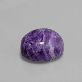 Charoíta violeta natural 5,09ct, corte oval, opaco