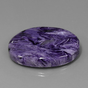 Charoíta violeta natural 84,76ct, corte oval, opaco