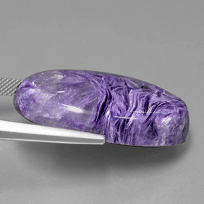 Charoíta violeta natural 38,15ct, corte oval, opaco