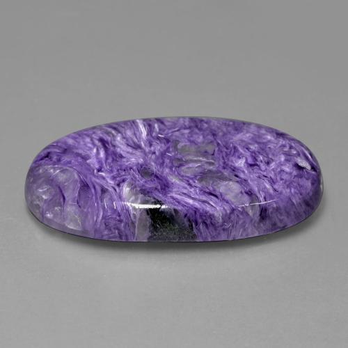 Charoíta violeta natural 49,22ct, corte oval, opaco