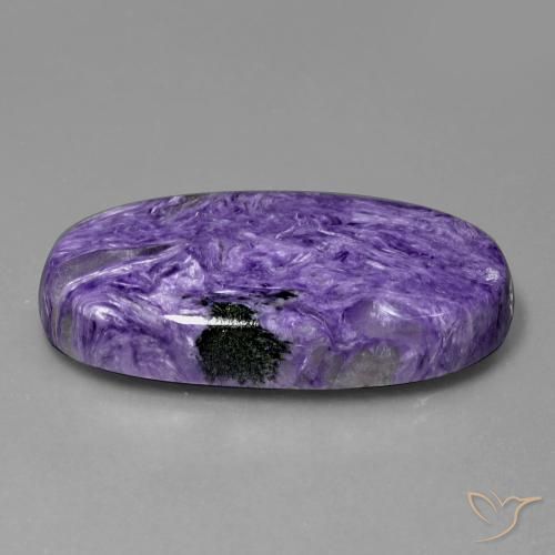Charoíta violeta natural 55,43ct, corte oval, opaco