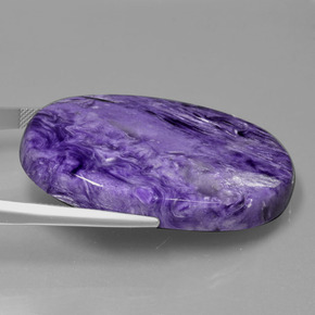 Charoíta violeta natural 84,93ct, corte oval, opaco