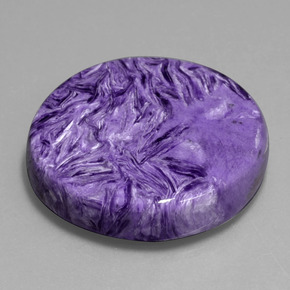 Charoíta violeta natural 77,96ct, corte redondo, opaco