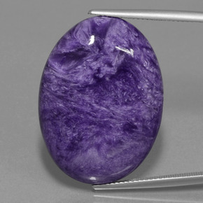 Charoíta violeta natural 34,37ct, corte oval, opaco