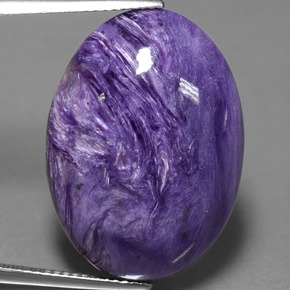 Charoíta violeta natural 22,88ct, corte oval, opaco