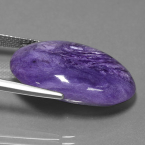 Charoíta violeta natural 22,88ct, corte oval, opaco