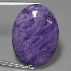 Charoíta violeta natural 26,08ct, corte oval, opaco