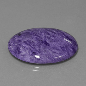 Charoíta violeta natural 26,08ct, corte oval, opaco
