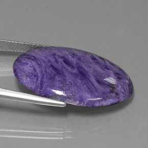 Charoíta violeta natural 26,08ct, corte oval, opaco