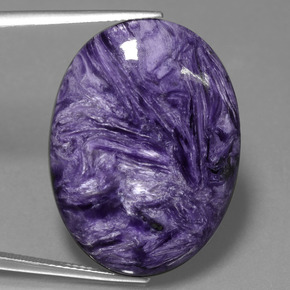 Charoíta violeta natural 31,24ct, corte oval, opaco