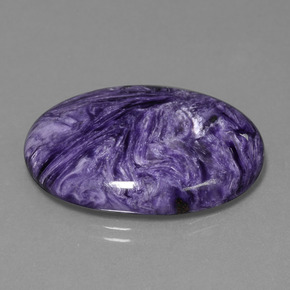 Charoíta violeta natural 31,24ct, corte oval, opaco