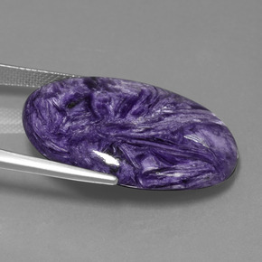 Charoíta violeta natural 31,24ct, corte oval, opaco
