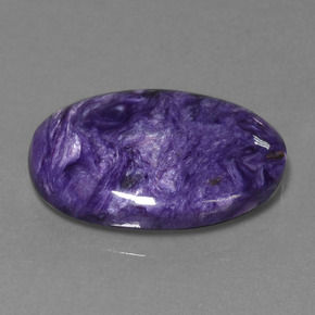 Charoíta violeta natural 32,90ct, corte oval, opaco
