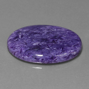 Charoíta violeta natural 27,82ct, corte oval, opaco