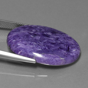 Charoíta violeta natural 27,82ct, corte oval, opaco