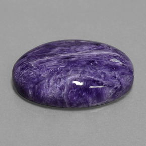 Charoíta violeta natural 22,07ct, corte oval, opaco