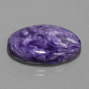 Charoíta violeta natural 19,58ct, corte oval, opaco