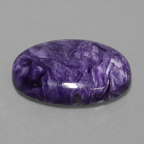 Charoíta violeta natural 19,61ct, corte oval, opaco