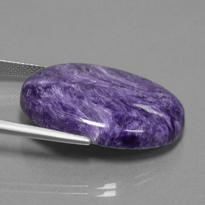 Charoíta violeta natural 33,16ct, corte oval, opaco