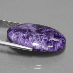 Charoíta violeta natural 29,03ct, corte oval, opaco