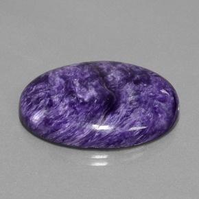 Charoíta violeta natural 29,80ct, corte oval, opaco
