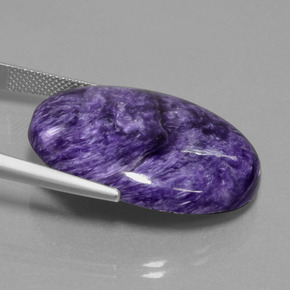 Charoíta violeta natural 29,80ct, corte oval, opaco