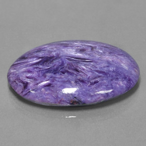Charoíta violeta natural 31,73ct, corte oval, opaco