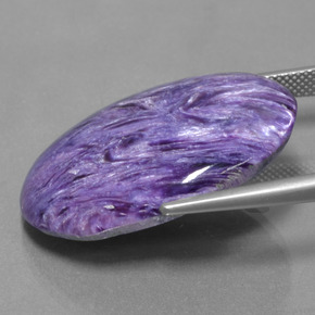 Charoíta violeta natural 31,73ct, corte oval, opaco