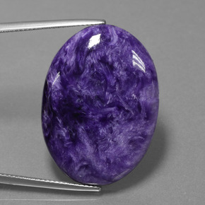 Charoíta violeta natural 27,61ct, corte oval, opaco