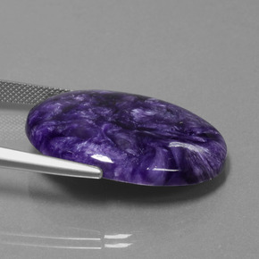 Charoíta violeta natural 29,06ct, corte oval, opaco