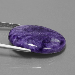 Charoíta violeta natural 26,43ct, corte oval, opaco