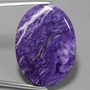 Charoíta violeta natural 23,27ct, corte oval, opaco